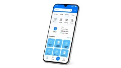 Tampilan utama aplikasi Sekolah Kita menampilkan dashboard dengan fitur-fitur utama